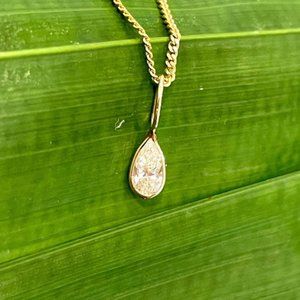 Solid 14k Diamond Pendant 15 x 4 mm.